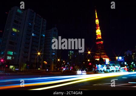 Night crossing behind the high tower in Tokyo Stock Photo