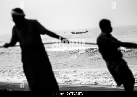 Fishermen at Kappil Beach, Varkala, Kerala, India Stock Photo