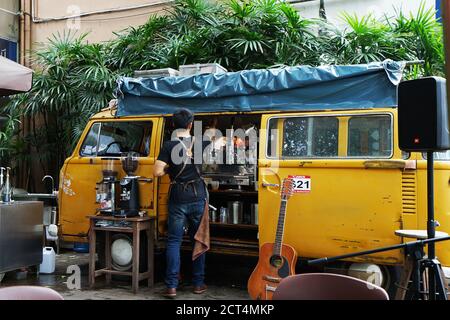 Exterior design and decoration of local coffee cafe decorated with Yellow van car- Chiang mai, Thailand Stock Photo