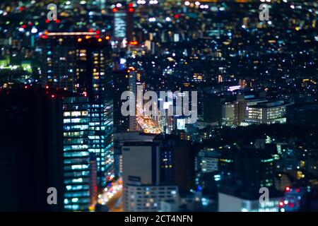 A night miniature highway at the urban city in Tokyo high angle tiltshit Stock Photo