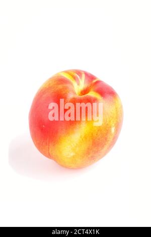 Nectarine isolated on white background. Side view, close up. Stock Photo