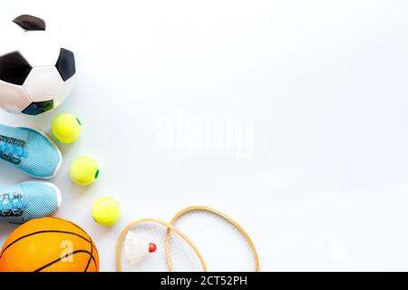Flat lay of sport balls - football, basketball on white background copy space Stock Photo