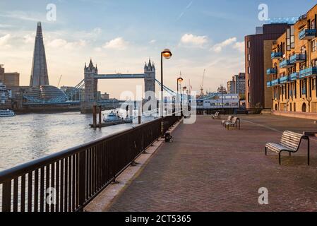 Tower Bridge and the Shard at sunset, seen behind the River Thames, Tower Hamlets, London, England Stock Photo