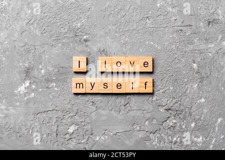 I Love myself word written on wood block. I Love myself text on cement table for your desing, concept. Stock Photo