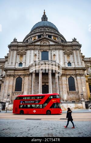 Red London Bus in front of St Pauls Cathedral, City of London, London, England Stock Photo