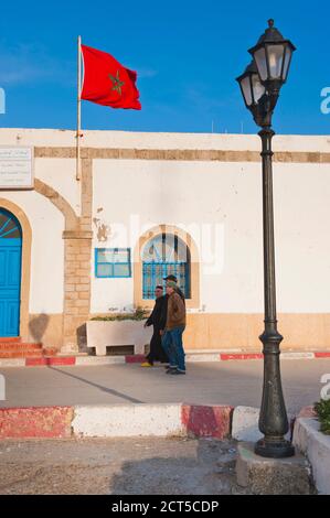 Group of Moroccans walking in Essaouira, formerly Mogador, Morocco, North Africa, Africa Stock Photo