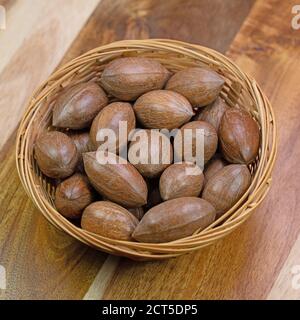 Pecans in a basket Stock Photo