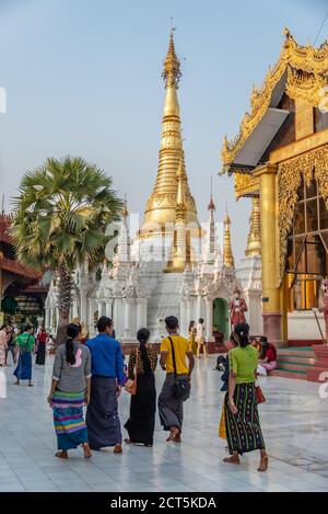 People visiting Shwedagon pagoda, in Yangon Burma Myanmar Stock Photo