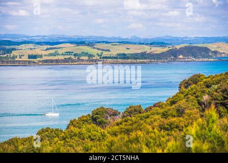 Sailing boat in the Bay of Islands seen from Russell, Northland Region, North Island, New Zealand Stock Photo