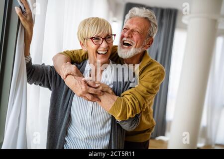 Cheerful senior couple enjoying life and spending time together Stock Photo