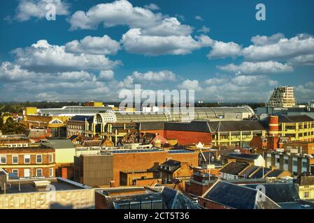 An aerial view over the rooftops of Kingston upon Thames, London, UK - the arched roof of the Bentall Centre is prominent in the shopping centre Stock Photo