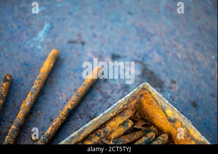 Old metal studs covered in rust, close-up, selective focus Stock Photo