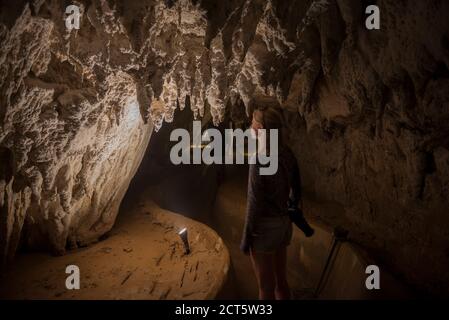 Tourist in Waitomo Caves, Waikato Region, North Island, New Zealand Stock Photo