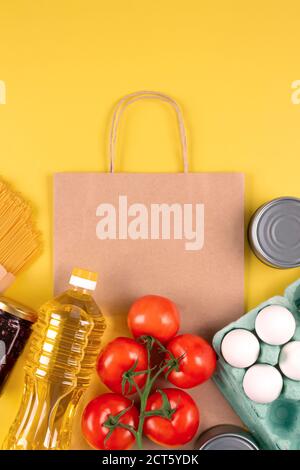 Download Food Donations On Yellow Background With Paper Bag Mockup And Copyspace Pasta Fresh Vegatables Canned Food Organic Eggs And Oil Donation Food Stock Photo Alamy PSD Mockup Templates