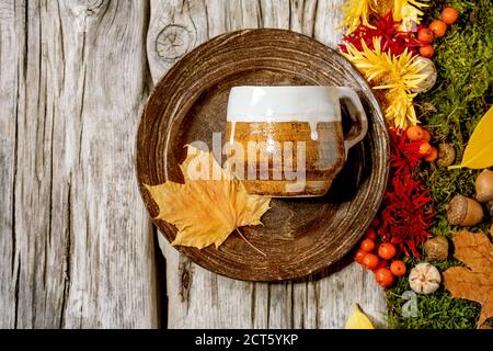 Autumn tablesetting with moss and leaves Stock Photo