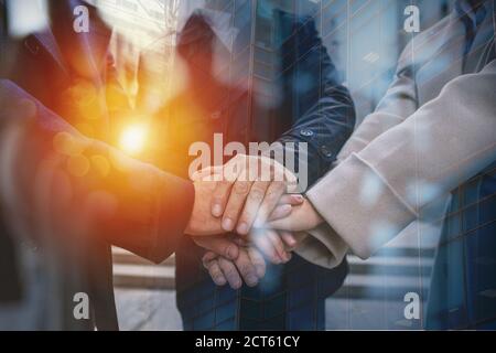 Business people putting their hands together. Concept of teamwork and partnership Stock Photo