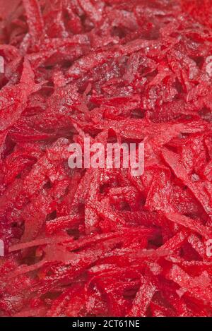 Freshly grated beetroot background with selective focus Stock Photo