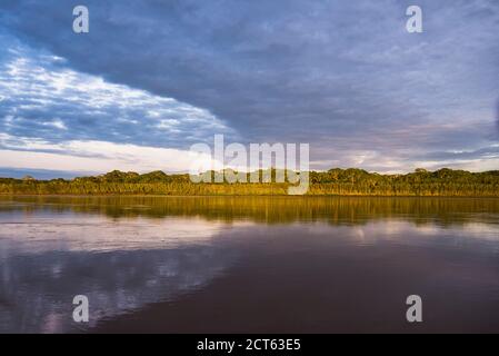 Sunrise over river in Amazon Jungle of Peru, Tambopata National Reserve, Peru, South America Stock Photo