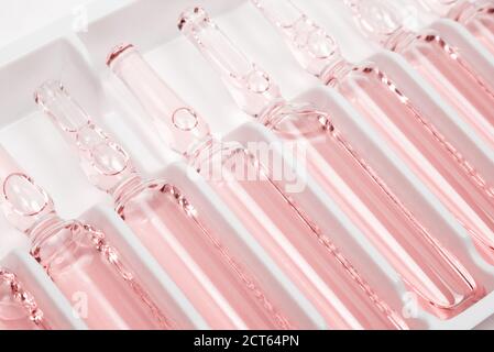 Closeup of row of red ampules in package with selective focus Stock Photo