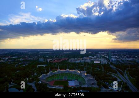 Munich Olympiapark aerial view in the dusk . Beautiful clouds over the city Stock Photo