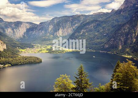 Hallstatt is a village on Lake Hallstatt's western shore in Austria's mountainous Salzkammergut region Stock Photo