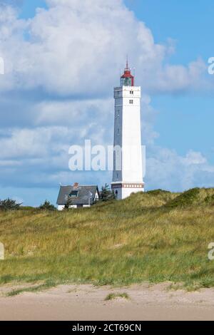 Lighthouse at Blåvand, Denmark, dune in foreground Stock Photo