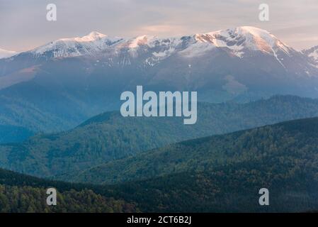 Carpathian Mountains at Ranca at sunrise, Parang Mountains, Oltenia Region, Romania, background with copy space Stock Photo