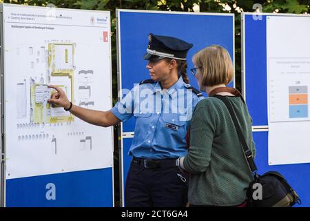 Oranienburg, Germany. 21st Sep, 2020. Two women stand in front of construction drawings on the grounds of the former police station in Oranienburg (Brandenburg). On the area of the old and dilapidated former police station the planned dormitory of the police academy is to be built. Credit: Paul Zinken/dpa/Alamy Live News Stock Photo