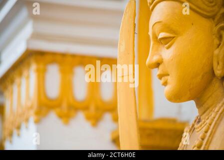 Sacred City of Anuradhapura, Sri Maha Bodhi, gold statue close up in the Mahavihara (The Great Monastery), Sri Lanka, Asia Stock Photo