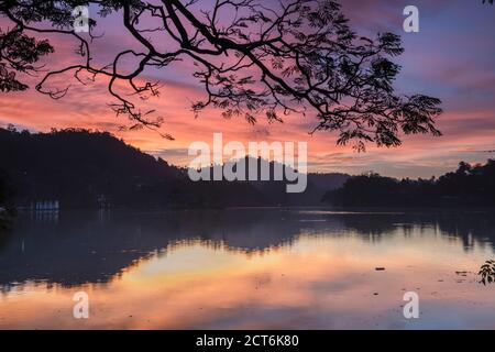 Dramatic sunrise at Kandy Lake and the Clouds Wall (Walakulu Wall), Kandy, Central Province, Sri Lanka, Asia Stock Photo
