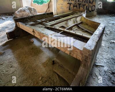 old piano in an abandoned house Stock Photo