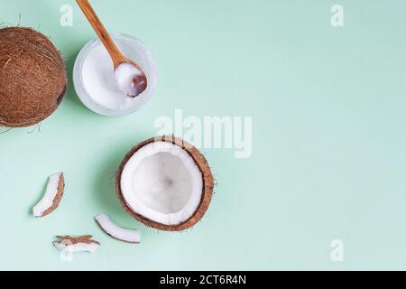Coconuts on blue background, top view. Stock Photo