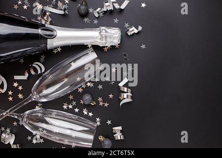 New Year Eve composition on black background. Stock Photo