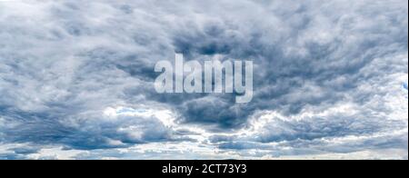 textural blue dark sky clouds, gloomy landscape. Stock Photo