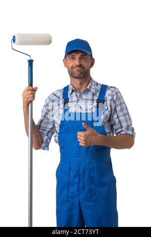 Portrait of male house painter with paint roller showing thumb up isolated on white background Stock Photo