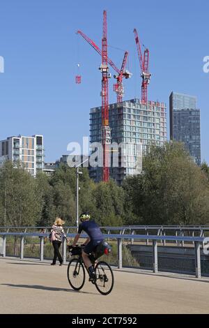 Cranes on site of the construction of the Olympic village complex, East ...