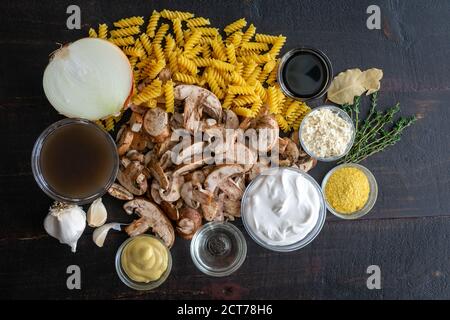 Vegan Mushroom Stroganoff Ingredients: Raw foods used to make a vegan version of mushroom stroganoff Stock Photo