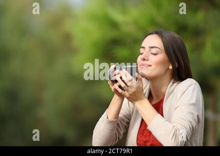 Relaxed teenager breathing fresh air in a loch Stock Photo - Alamy