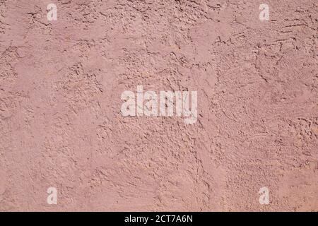 Pink Stucco wall texture. Beautiful concrete stucco. Painted cement Surface design banners. Stock Photo