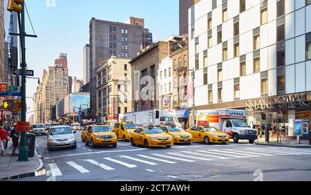 New York, USA - August 15, 2015: Cars on a street of Manhattan. Stock Photo