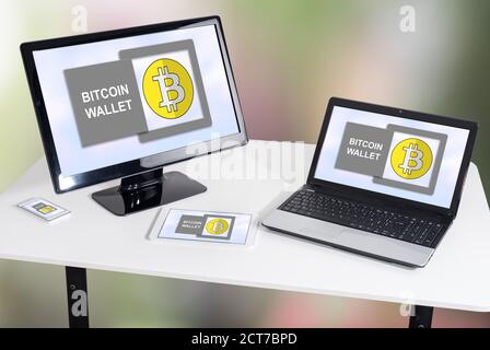Bitcoin wallet concept shown on different information technology devices Stock Photo