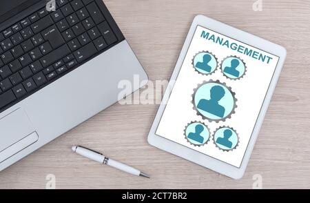 Management concept shown on a digital tablet Stock Photo
