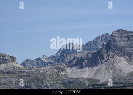 Antonio Locatelli Hut close to the Three Peaks as seen from Monteo Piano in Sexten Dolomites, South Tyrol, Italy Stock Photo