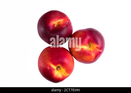 three whole peach on a white background Stock Photo