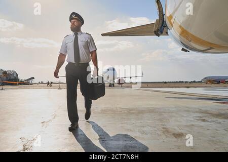 Experienced specialist ready for the working day in the sky Stock Photo