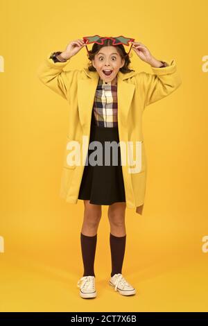 Celebrity child. Star concept. Fame and popularity. Cheerful girl wear eyeglasses. Cool kid celebrity. Popular schoolgirl. Carnival costume famous celebrity. Dreaming about fame. Become popular. Stock Photo