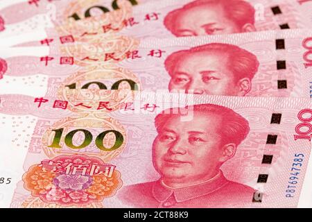 Collage of New Chinese 100 RMB or Yuan featuring Chairman Mao on the front of each bill Stock Photo