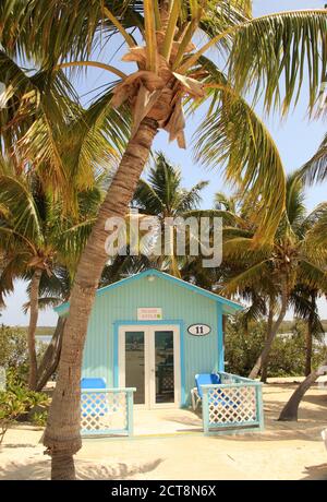 Colorful cabanas along the beach at Princess Cays in the Bahamas Stock Photo