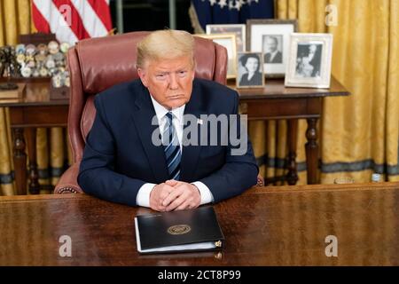 WASHINGTON DC,USA- 11 March 2020 - President Donald J Trump addresses the nation from the Oval Office of the White House Wednesday evening, March 11, Stock Photo