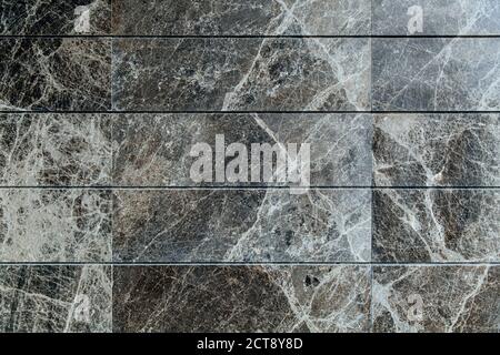 Marble natural texture background. Marble stone slabs lie in a row. Stock Photo